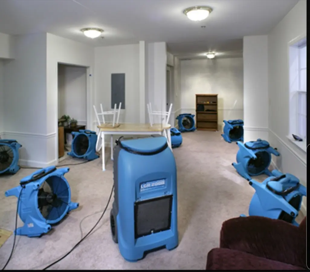 Air movers and dehumidifier setup for Water Damage Restoration in Grenada